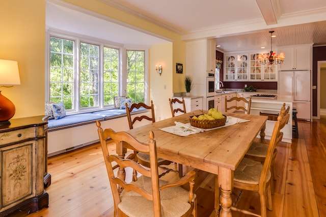 a farmhouse kitchen with rectangular brown wooden table and chair set