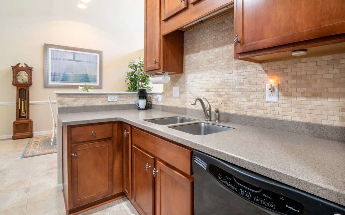 a kitchen counter with a sink